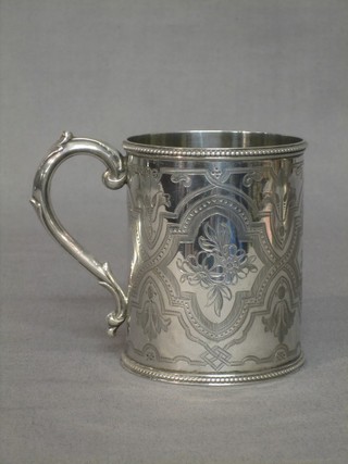A Victorian engraved silver cylindrical shaped christening tankard, London 1867
