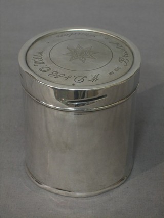 A cylindrical silver Will's cigarette canister, the lid marked W D & H Wills Bristol & London Sheffield 1931 4 ozs 