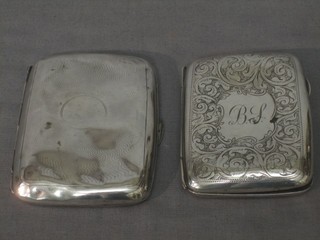 2 silver cigarette cases (heavily dented) 4 ozs