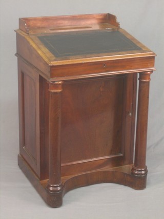 A  William IV rosewood Davenport with three-quarter gallery and pen receptical, the pedestal raised on turned columns 23"