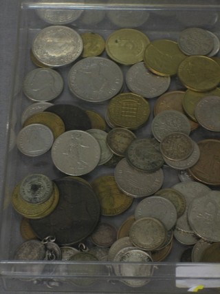 A small collection of silver sixpences, various crowns and other coins