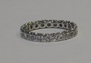 A lady's full eternity ring set numerous diamonds