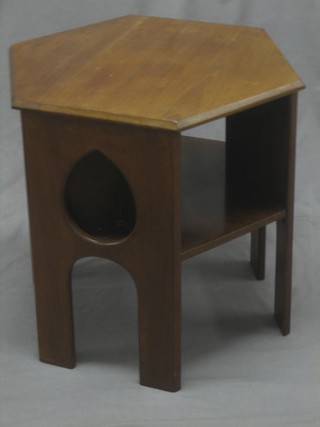 An octagonal walnut Arts & Crafts table fitted an undertier 24"