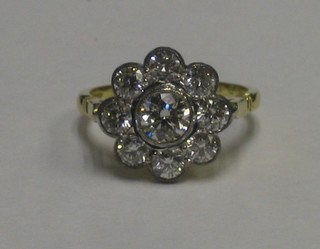 A lady's 18ct yellow gold cluster dress ring set 9 diamonds approx 1.80ct