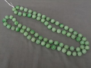 A string of modern green hardstone beads
