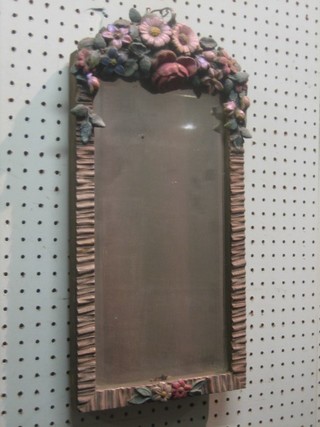 A 1920's rectangular bevelled plate easel mirror contained in a Barbola mounted frame 18" x 9"