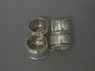 4 Continental silver napkin rings