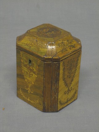 A 19th Century inlaid mahogany tea caddy with hinged lid inlaid cherubs and with floral swags 3 1/2"