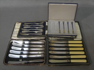 4 Danish Sterling and enamelled pastry forks, 6 silver handled tea knives, 6 tea knives with bone handles and 6 pastry forks, all cased