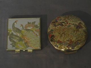 An Iris gilt metal compact and 1 other