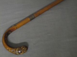 A Melacca walking cane with silver band