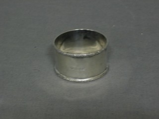 A silver napkin ring