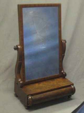 A 19th Century rectangular plate dressing table mirror contained in a mahogany swing frame, the base fitted a drawer 16 1/2"