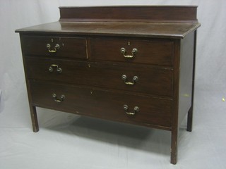 An Edwardian mahogany chest of 2 short and 2 long drawers raised on square supports 45"