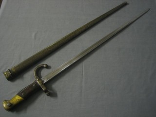 A French chassepot bayonet, the bladed dated 1880 complete with scabbard
