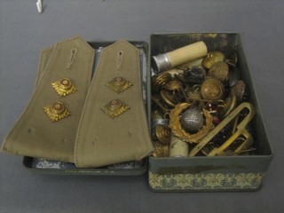 A wooden box containing various underwater matches, Royal Marine cloth titles and pips