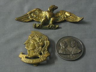 A brass artists rifles cap badge, a medallion to commemorate Kaiser Franz Joseph and Kaiser Wilhelm and a brass figure of an eagle with wings outstretched
