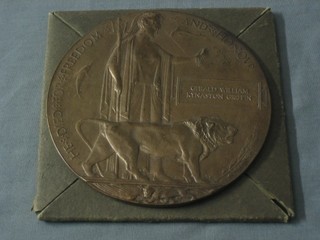 A WWI Death Plaque to Gerald William Kynaston Griffin complete with Buckingham Palace letter and cardboard case