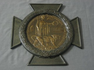A WWI Death plaque to Clarence Harold Churchill contained in an embossed frame