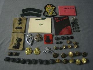 A  collection of various RAF  buttons, Royal Ulster Rifle badges, shoulder titles, Royal Ulster Christmas card and a bag of nails, Officer's Club pass, etc