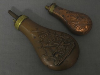 An embossed copper powder flask marked Colt Pattern by Dixon & Sons