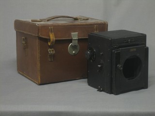 The Westminster wooden framed camera case, marked Special Ruby, contained in a leather carrying case