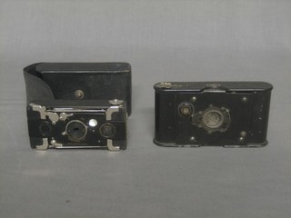A Kodak Vest Pocket camera together with an Ensign folding camera (2)