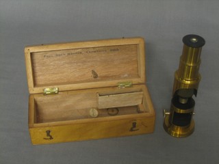 A student's brass single draw microscope