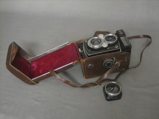 A Yashica MAT camera, cased
