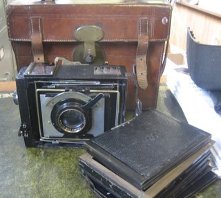 A single plate camera by Carl Zeiss Jean contained in a leather carrying case