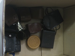 A Heydes Actino photo meter, a Capital DI light meter, a Hanimex Sekonic cased, a Sunset attic light meter and other light meters contained in a  cardboard box together with 4 various flashes 
