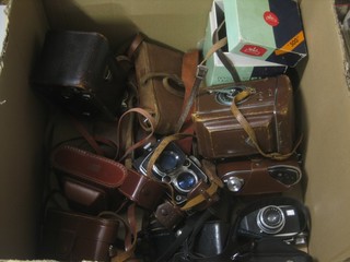 A Yashica-MAT LM, a Microcord, a Yashica 635, a Walzflex, 2 folding cameras and 6 other cameras