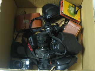 A Pentax P30T, a Pentax A3, a Yashica Electron 35, a Nicon FG20, 7 other cameras and a folding camera