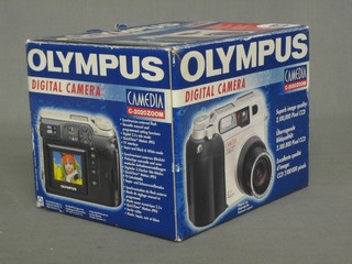 An Olympus digital camera boxed