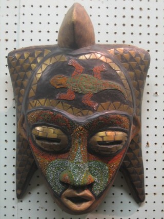 An Eastern painted wall mask