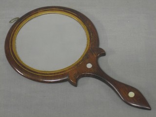 A Victorian inlaid mahogany double sided magnifying hand mirror