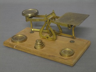 A pair of 19th Century brass letter scales