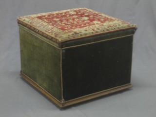 A Victorian square ottoman with hinged lid, upholstered in carpet material 21"