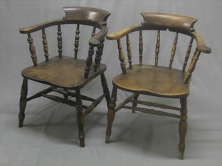 A pair of smoker's bow elm chairs 