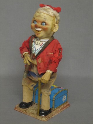 A Japanese TM battery operated and tin plate automaton in the form of a smoking gentleman