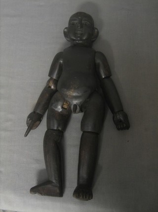 An 18th/19th Century carved wooden double headed and gendered doll with articulated limbs 14"