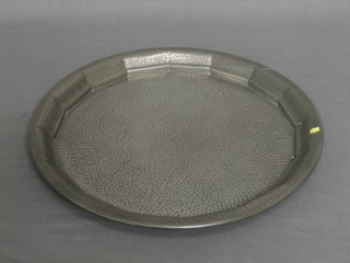 A circular planished pewter tray by Knighthood 13" 