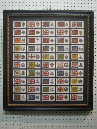 A set of 50 Players cigarette cards - Regimental Standards and Cap badges, contained in a double sided frame