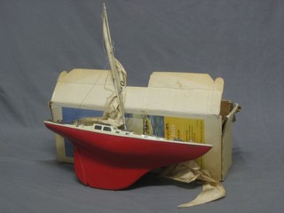 A Triang 24" model of a racing yacht, boxed