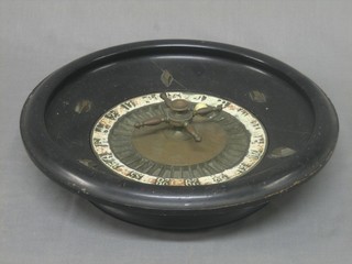 An old wooden roulette wheel 14"