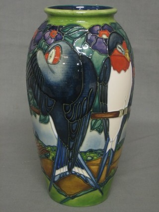 A Moorcroft Australian/South African design vase decorated a bird, the base impressed Moorcroft Made in England with flat iron mark and marked 81500 Beverly Wilkes for Moorcroft 17th 10 98, 10" 