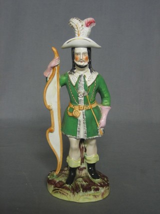 A 19th Century Staffordshire figure of a standing archer 11"