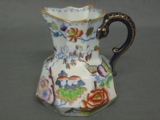 A Masons Ironstone octagonal jug, the handle in the form of a blue serpent, the base with blue Masons Ironstone mark 5"