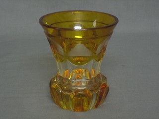 An amber Bohemian club shaped glass vase with etched decoration of various tourists sights 5" 