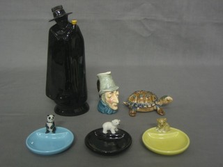 A Wade Sandeman decanter (chipped), a Wade figure of a tortoise and 3 various Wade figures of animals and a Sylvac character jug
